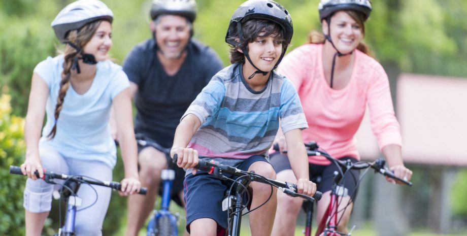Family biking outdoors